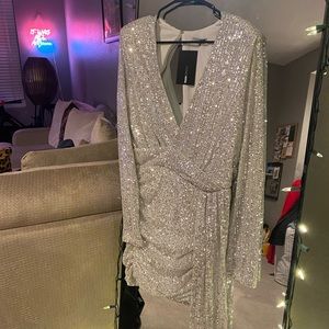 Silver party midi dress with shoulder pads.